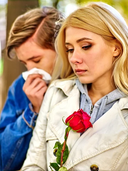 People with a cold blowing nose  handkerchief fall outdoor. — Stock Photo, Image