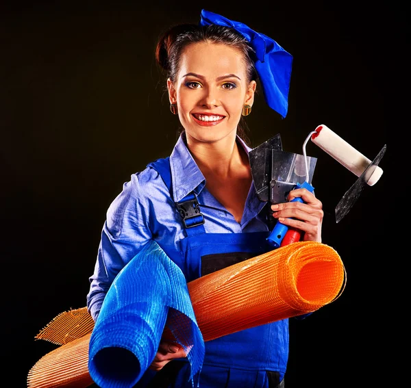 Femme constructeur avec des outils de construction — Photo