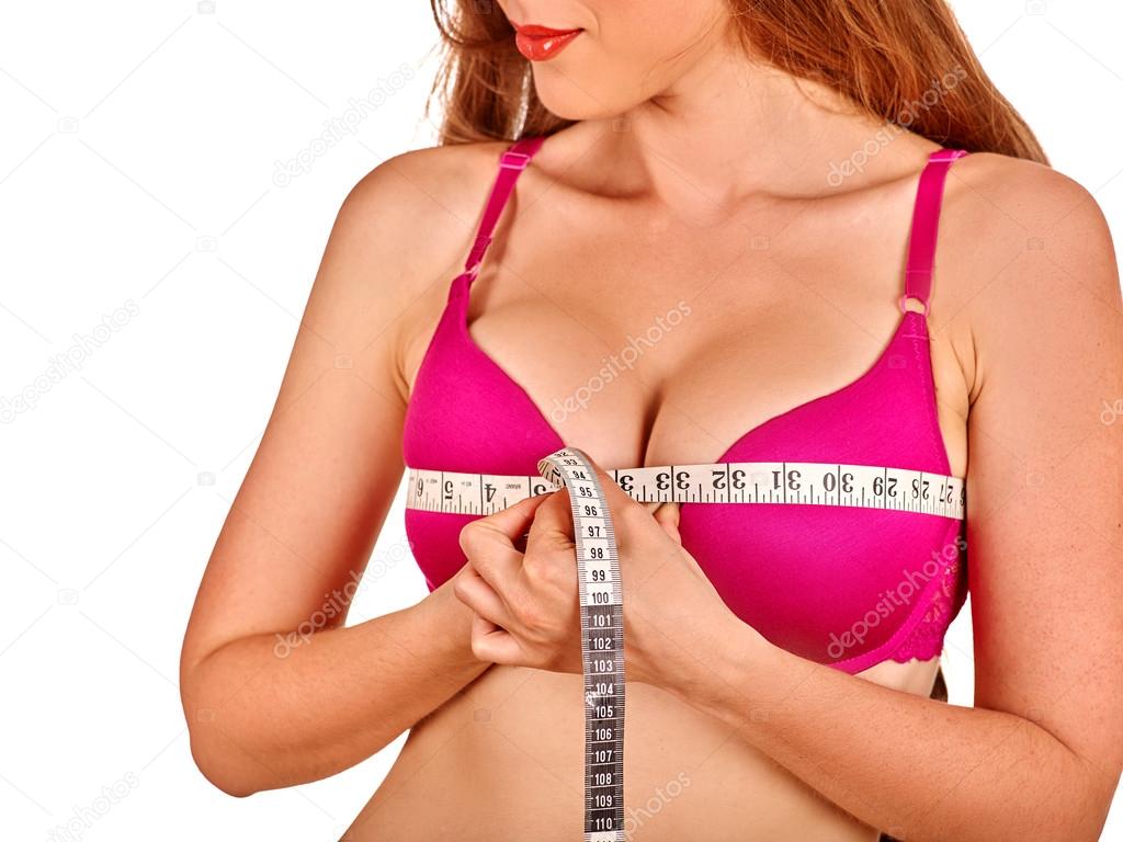 Girl wearing lingerie measures body