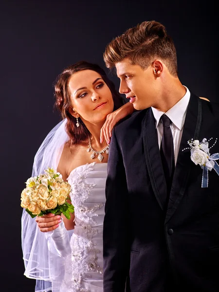 Couple wearing wedding dress and costume. — Stock Photo, Image