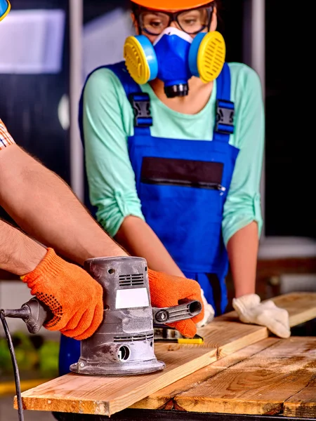 Woman builder  with special tool. — Stock Photo, Image