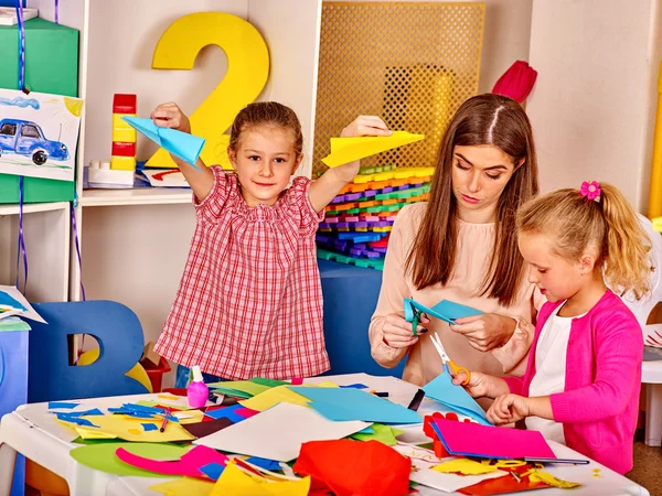 Female kids make origami — Stock Photo, Image