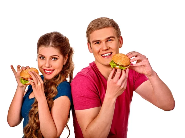 Muž a žena jíst velké sendvič s colou. Izolovaný. — Stock fotografie
