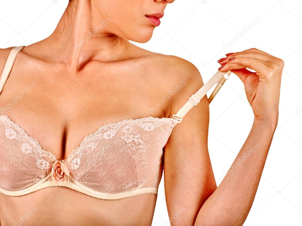 Woman in  bra strap straightens.