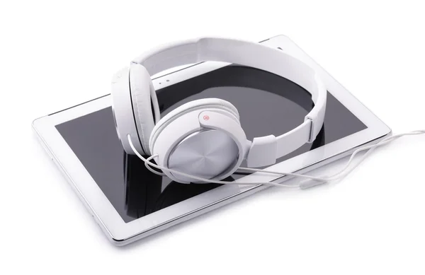 Tablet PC and headphones — Stock Photo, Image