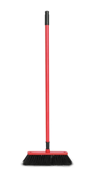 Red plastic broom Stock Photo