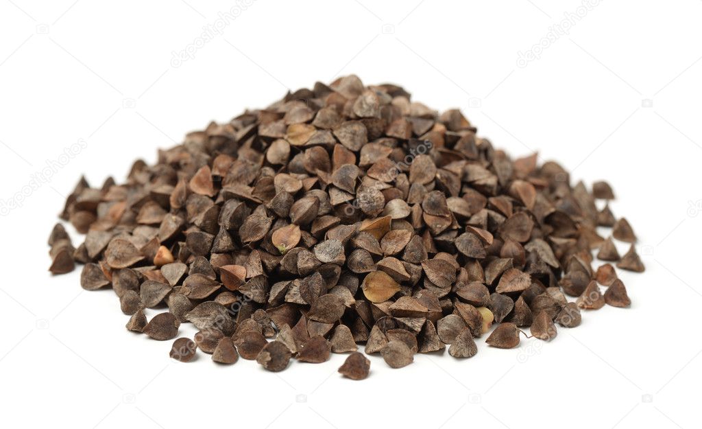 Pile of unhulled buckwheat — Stock Photo © coprid 122672450