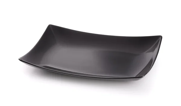 Черная квадратная пустая тарелка — стоковое фото