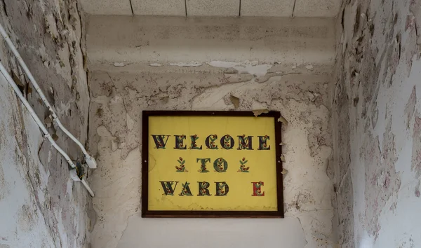 Painted sign inside Trans-Allegheny Lunatic Asylum — Stock Photo, Image