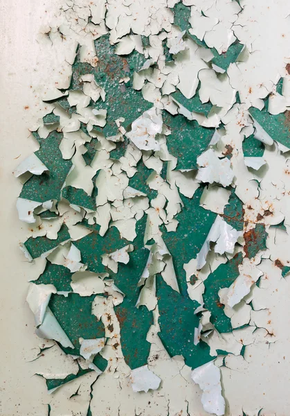 Pintura verde vieja en la pared que despega — Foto de Stock