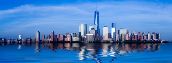 Panorama of lower Manhattan of New York City from Exchange Place at dusk with World Trade Center. Sized to fit a popular social media cover image placeholder