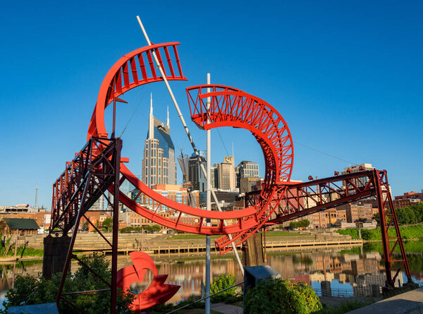 Modern sculpture frames the skyline of Nashville Tennessee