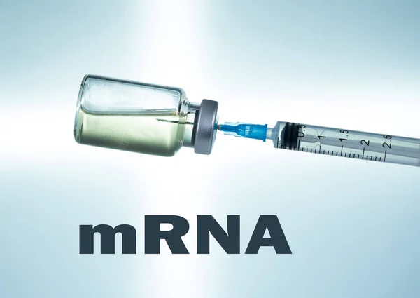 Hypodermic syringe needle inserted into a vaccine ampoule as mRNA concept