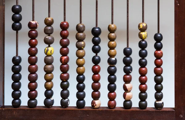 Antique abacus with painted wooden beads — Stock Photo, Image
