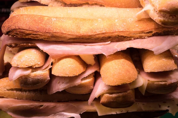 Stack of ham and cheese sandwiches in Madrid store — Stock Photo, Image