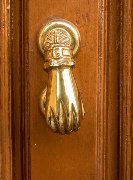 Detail of hand shaped door knocker — Stock Photo, Image