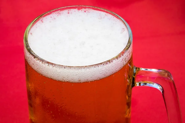 Golden lager or beer in traditional tankard — Stock Photo, Image