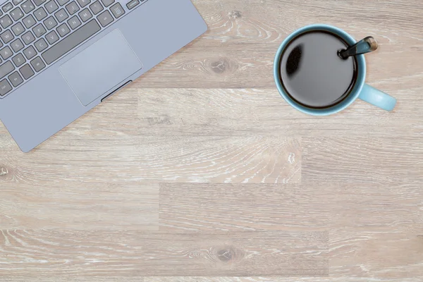 Hero Header image of tidy desktop with mug of coffee