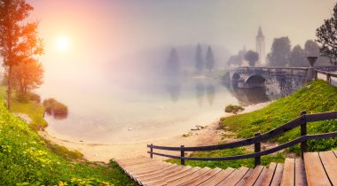 Majestic foggy morning on the lake