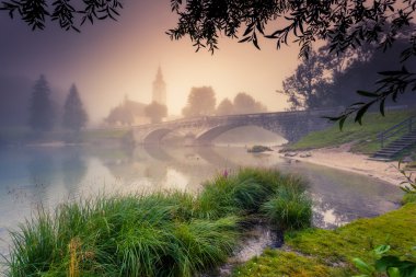 Colorful foggy scene on the lake