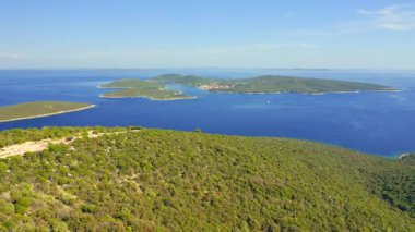 Incredible view of small Ilovik island from Losinj island. Bird's eye view. Location place Kvarner Gulf, Croatia, Europe. Cinematic drone shot. Filmed in UHD 4k video. Discover the beauty of earth.