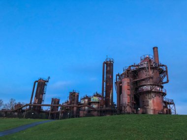 Gas Works Park is a park located in Seattle, Washington, United States. It is a 19.1-acre (77,000 m2) public park on the site of the former Seattle Gas Light Company gasification plant, located on the north shore of Lake Union at the south end of the clipart