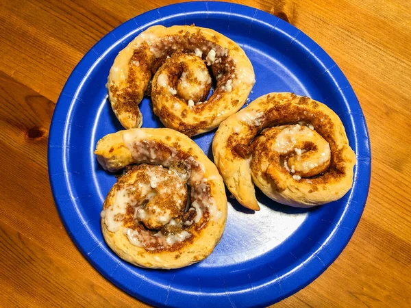 Cinnamon roll (also cinnamon bun, cinnamon swirl, cinnamon Danish and cinnamon snail) is a sweet roll served commonly in Northern Europe (mainly in Scandinavia) and North America. In Sweden it is called kanelbulle, in Denmark it is known as kanelsneg