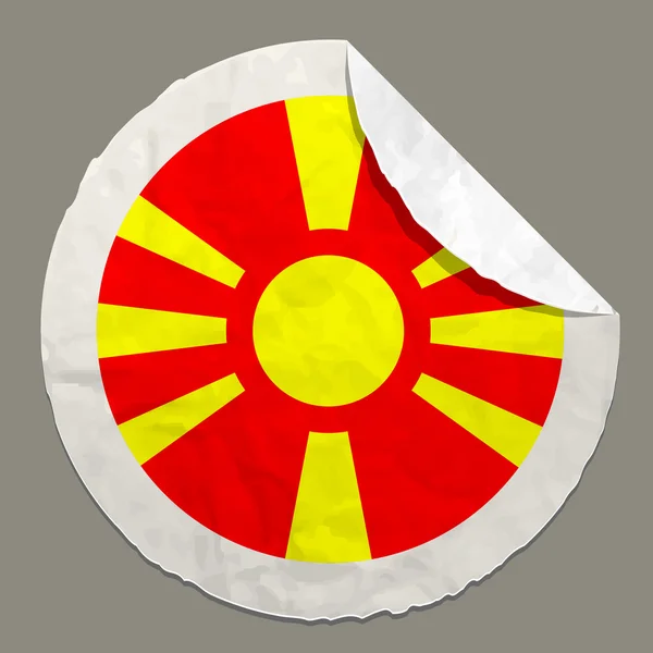 Флаг Македонии на бумажной этикетке — стоковый вектор