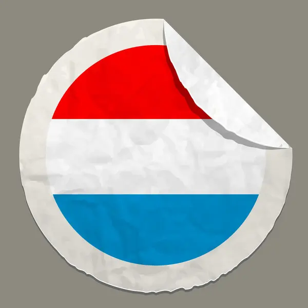 Bandera de Luxemburgo en una etiqueta de papel — Vector de stock