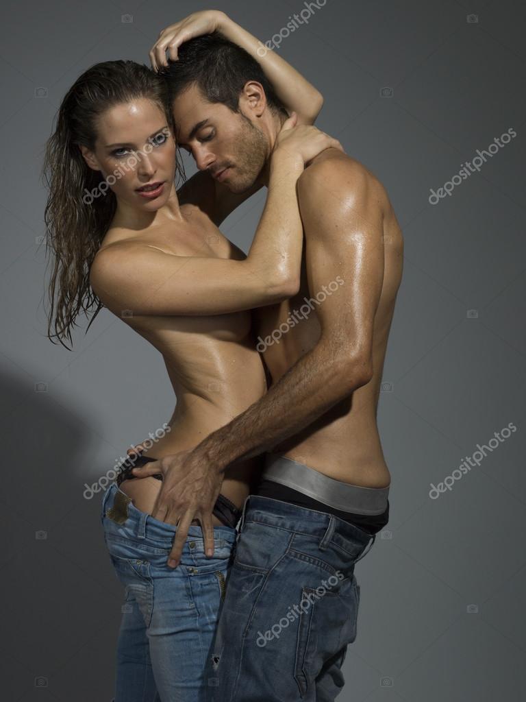 Erotic scene of a sexy couple in jeans having sex Stock Photo by ©Immfocus  105823088