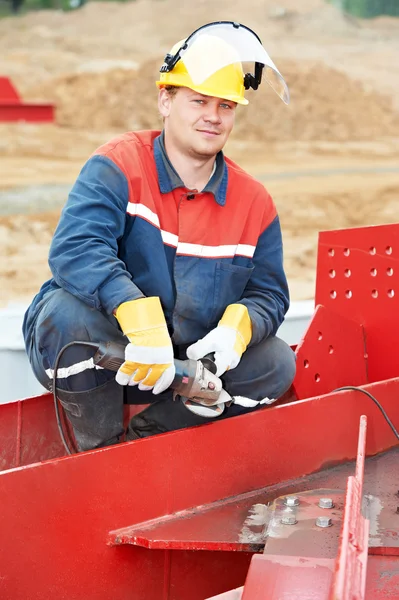 Builder arbetstagare på byggarbetsplatsen — Stockfoto