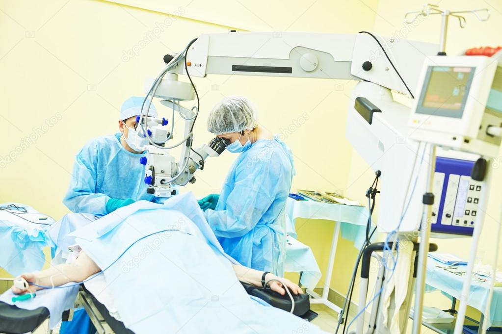 surgeon doctors in operation room