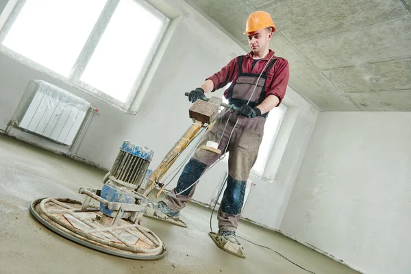 Floor machine grinding by power trowel — Stok fotoğraf