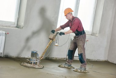floor machine grinding by power trowel