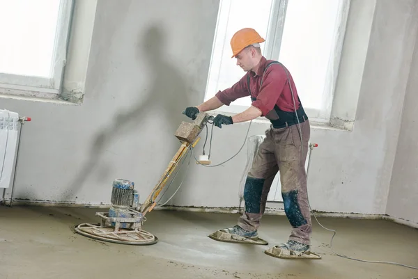 Floor machine grinding by power trowel — 스톡 사진