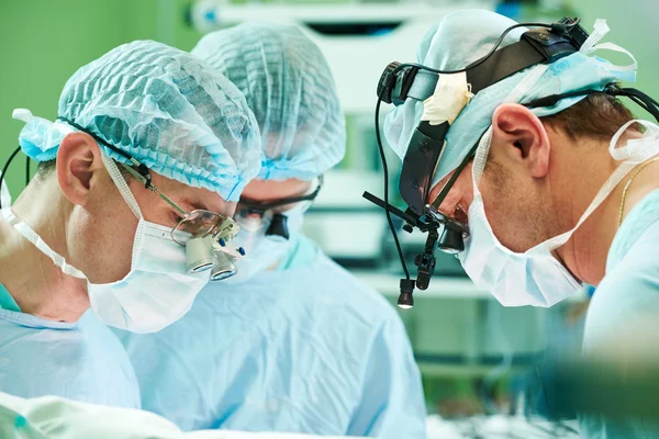 Male cardiac surgeon at child cardiosurgery operating room — Stock Photo, Image