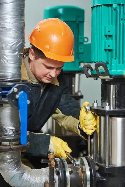 Technician of heating system in boiler room — Stock Photo, Image