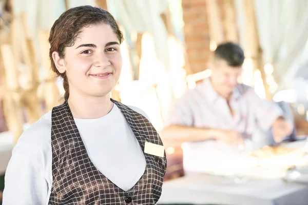 Portrait of waitress in a restaurant — Stock Photo, Image