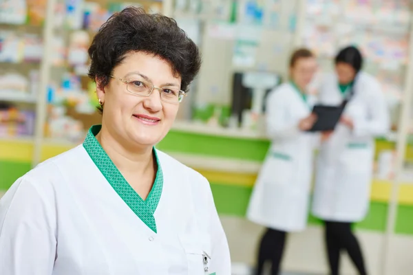 Pharmacy worker in drug store — Stock Photo, Image