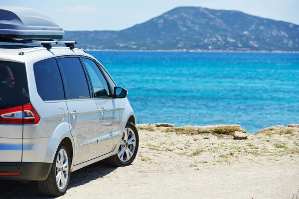 Travelling. Automobile minivan view near sea beach — Stock Photo, Image