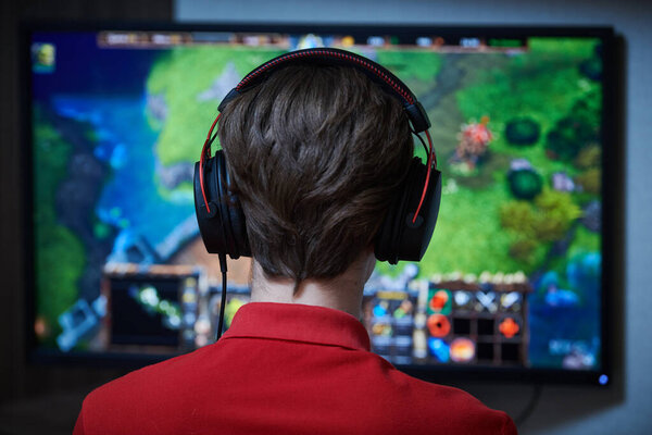 Playing game on personal computer. Quality assurance tester