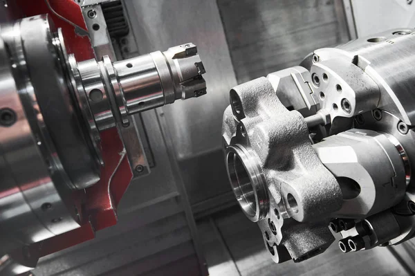 Cnc machine at work. cutting tool processing steel metal detail on turning cnc lathe machine in workshop — Stock Photo, Image