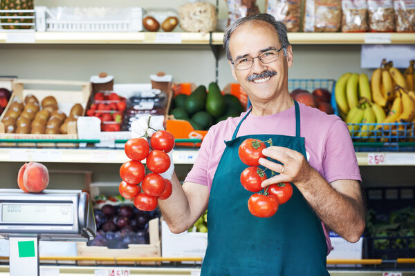seller man in fruit market shop