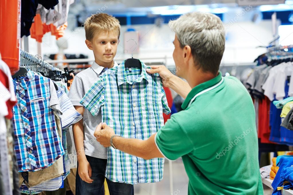 man and boy shopping clothes