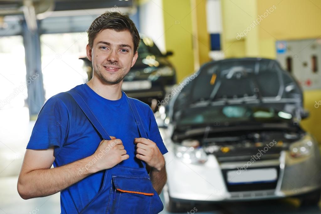 Repairman auto mechanic at work