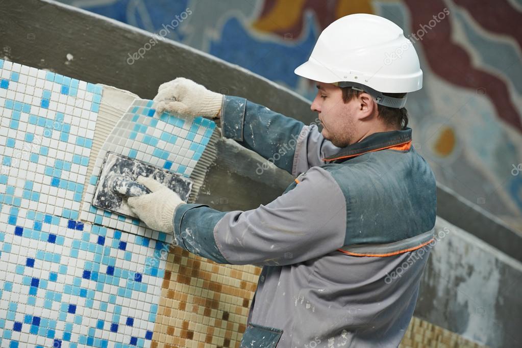 Tilers at industrial floor tiling renovation — Stock Photo © kalinovsky