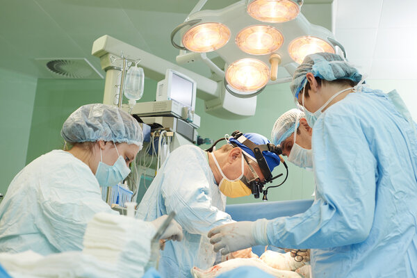 surgeons team at operation