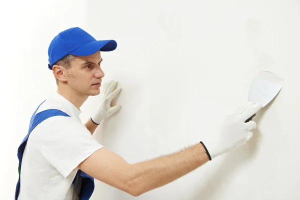 Plasterer at indoor wall work — Stock Photo, Image