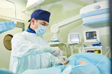 surgeon at vascular surgery operation clipart