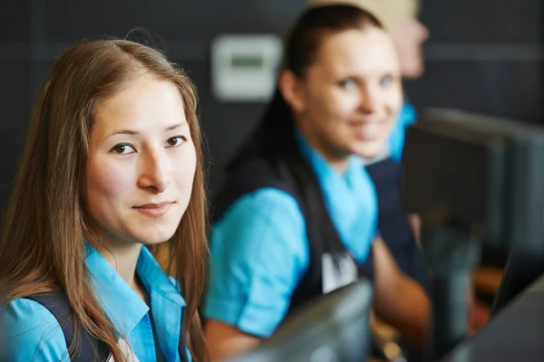 Hotel worker on reception or help desk — Stock Photo, Image